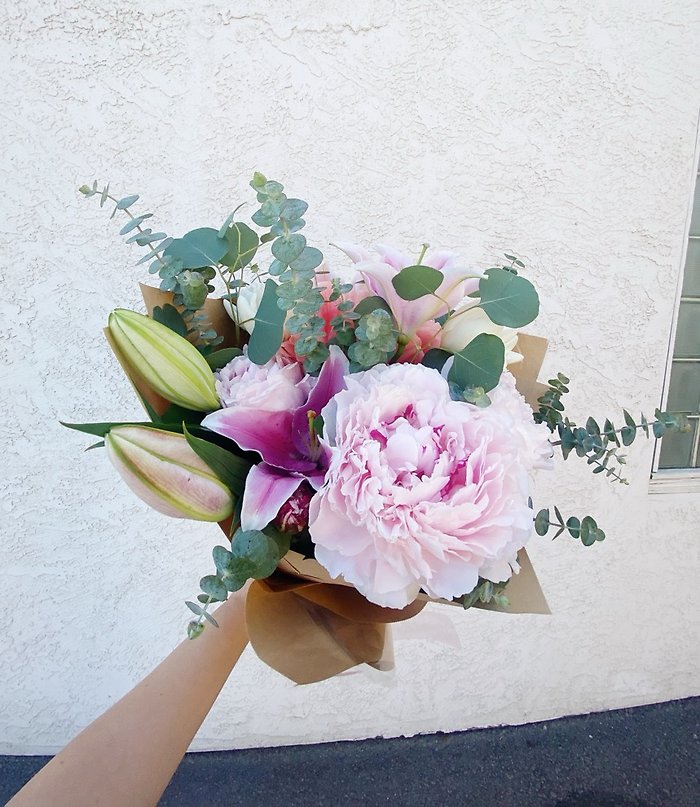 Custom Wraps by Garden District Flowers
