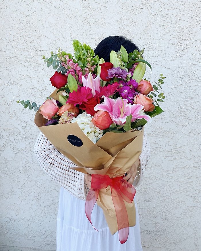 Custom Wraps by Garden District Flowers