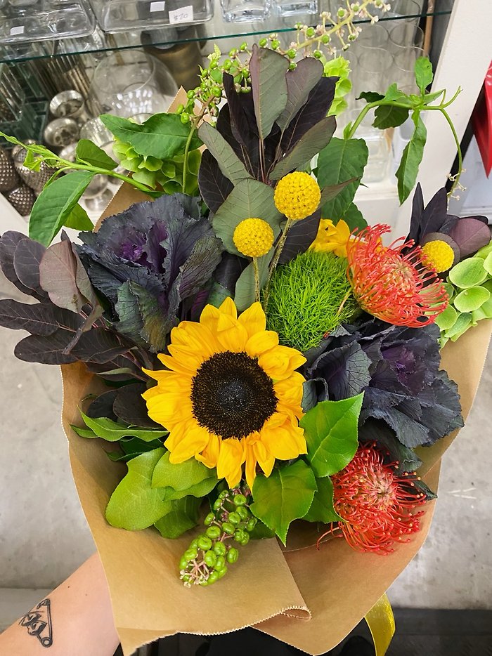 Custom Wraps by Garden District Flowers